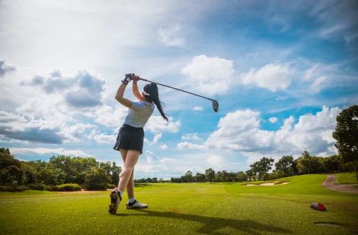 Woman playing on a golf course in Buenaventura, Panama