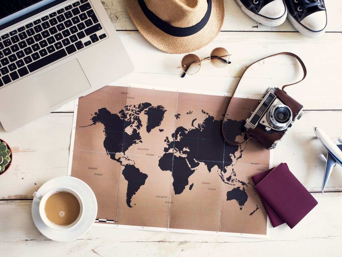 a world map with travel gear